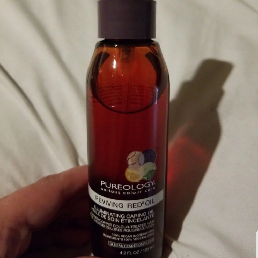 NEVER USED PUREOLOGY REVIVING RED OIL